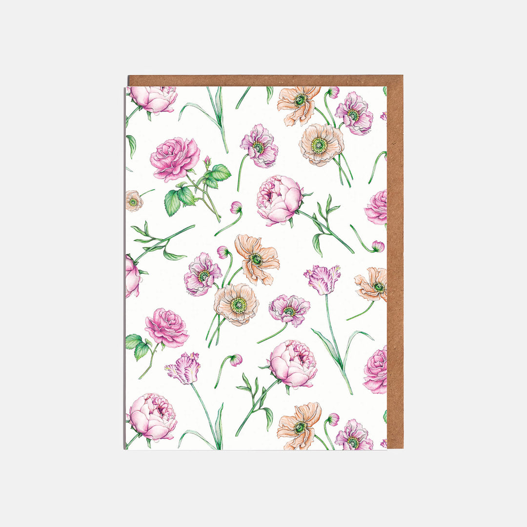 pink floral card with kraft envelope