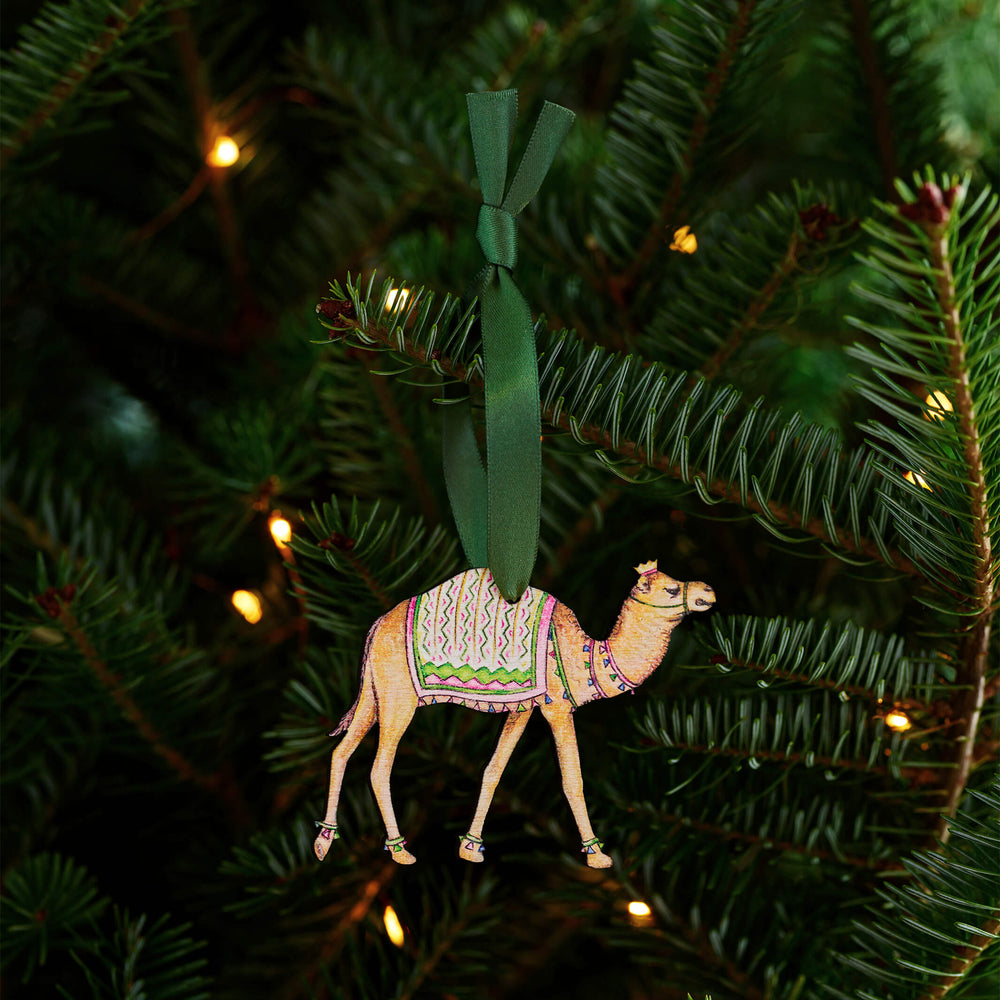 wooden camel christmas tree decoration with green ribbon