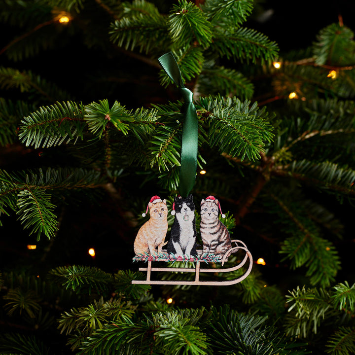 wooden cat christmas tree decoration with green ribbon