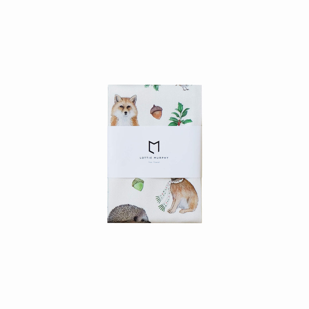 christmas woodland animal tea towel