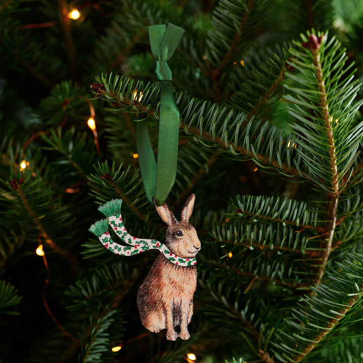 wooden hare christmas tree decoration with green ribbon